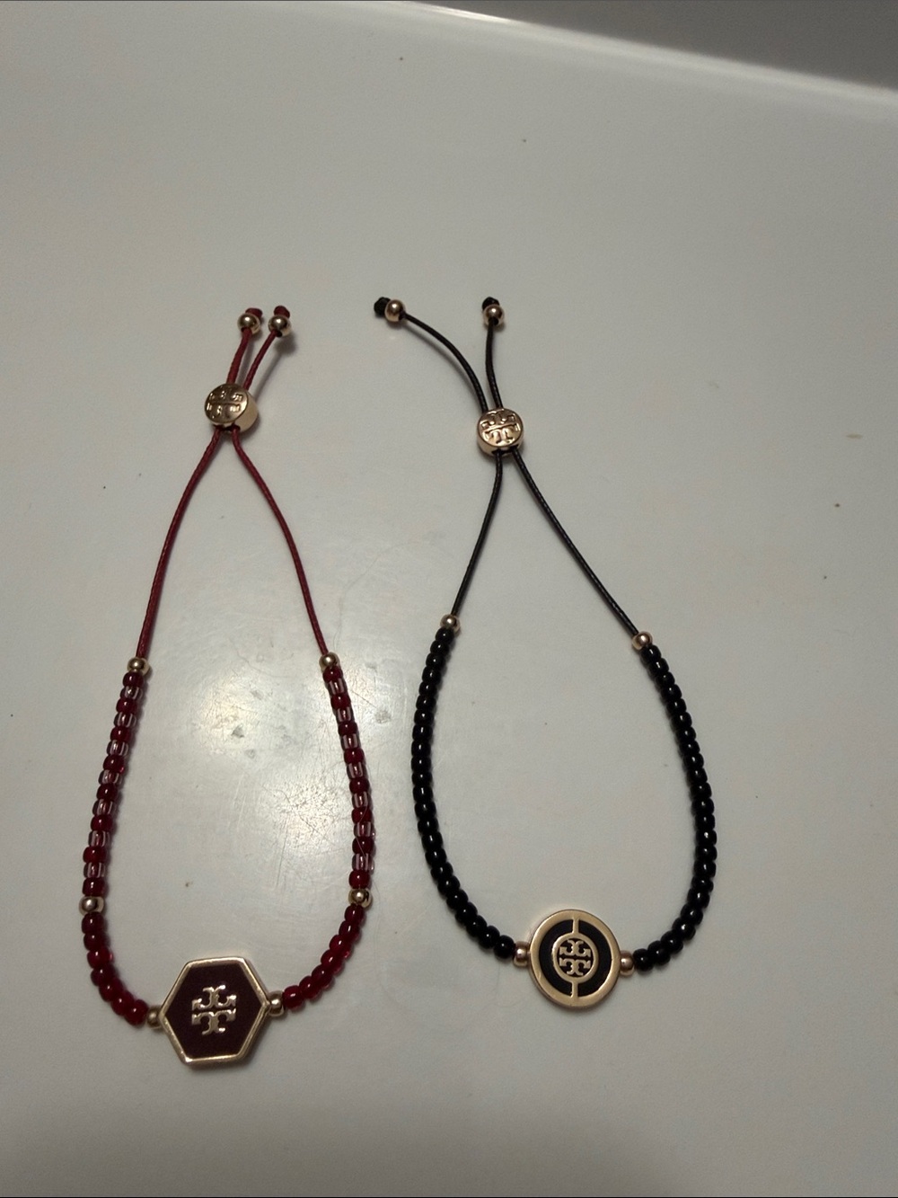 TWO Tory Burch Adjustable Beaded BraceletS - Red and Black